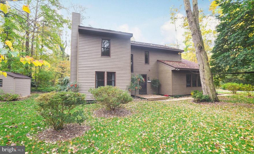 Wonderful Wildewood location--situated on a private larger-than-usual lot, this spacious home with nice updates is ready for you! Owners have upgraded their kitchen, changed out windows (Andersens!), flooring, and fixtures so you don't have to. You'll also enjoy the big screened porch they added, with custom vinyl pull-downs on the windows to make the space work nearly year-round, with a beautiful treed view! Main level offers a large eat-in kitchen with built-in shelving, exposed beams, tiled backsplash, and replaced appliances; family room/playroom; and sep LR w/wood-burning FP plus formal dining room, all with easy-care laminate floors. Utility room next to KT has pantry space, too. FIVE bedrooms upstairs, with new carpet ( 1 has hdwd floor), laundry closet, and tiled baths. Variable-speed Trane HVAC, 50-yr roof in '07, driveway repaved in '18, attached garage w/shelving--all on a secluded lot at the end of the cul-de-sac. Wildewood has walk/jog lanes and a rec area, and residents can join the pool complex if desired. Come see!