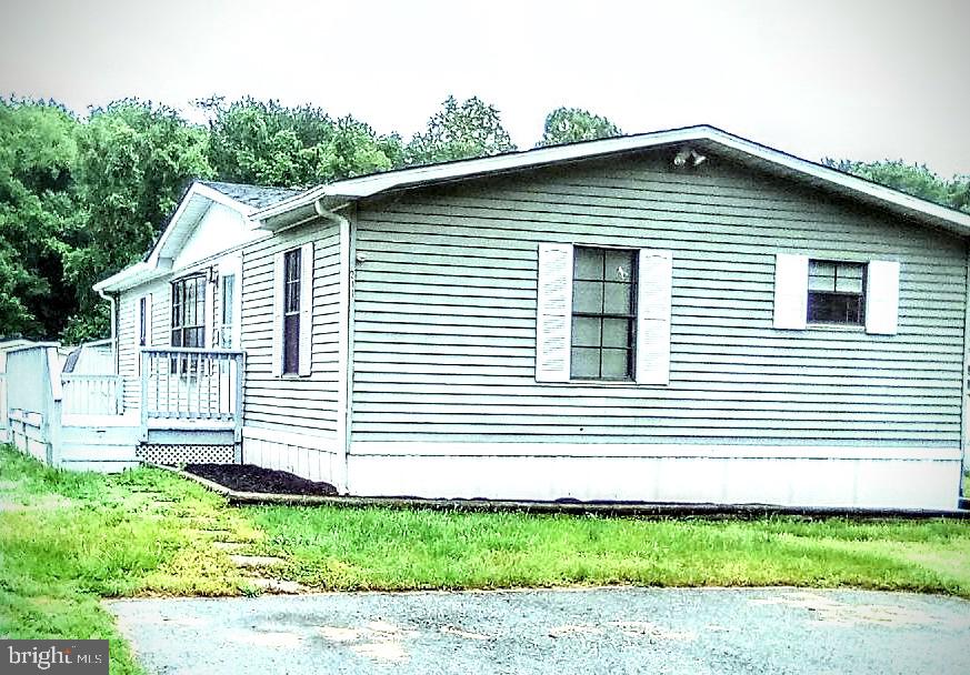 3 bed 2 bath Doublewide with double-deck in a quiet private country setting community within walking distance to water view and a fishing hole. Remodeled, new flooring, new roof, new countertops & light fixtures. All bedrooms have walk in closets. One story ranch style open floor plan.
Lot rent includes lot, Prop tax, trash and snow removal, water and sewer hook up, community management and maintenance, playground, basketball hoop and soon coming pavillion ($875)
Some Financing Available