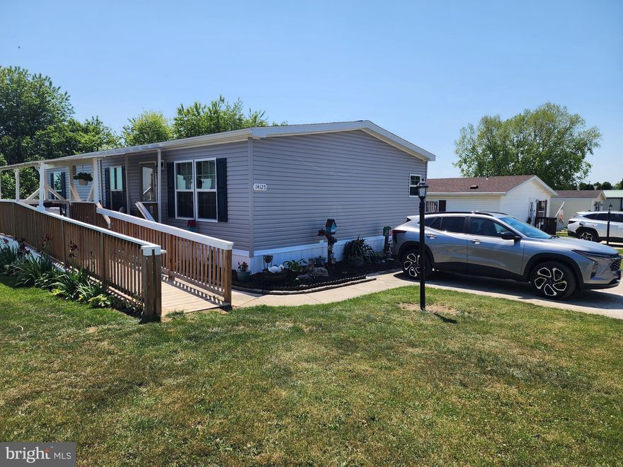 🏡 2024 Double‑Wide Manufactured Home – Spacious, Modern & Move‑In Ready
Hagerstown, MD – Larger Rented Lot Near Hagerstown Airport & I‑81

Step into comfort, convenience, and modern one‑level living in this 2024 (48' x 26' 8") double‑wide home located on a larger rented lot with mountain and farm‑field views. This 2 year old home is in very good condition and offers an open, layout with thoughtful accessibility features throughout.
Property Highlights include, 3 Bedrooms, 2 Full Baths, Primary bath with step‑in shower, Hall bath with tub/shower combo, Open Floor Plan, Bright living room flows into a spacious kitchen, Large center island with 2‑seat breakfast bar, Generous counter space, abundant cabinetry, and a cabinet pantry, Double sink and appliance package: refrigerator, stove/oven, built‑in microwave. Interior Features include
Attractive vinyl plank–look flooring with carpeted bedrooms, All window treatments convey, Large laundry room with washer/dryer, cabinet storage, and a secondary entry/exit door, Laundry room also houses the furnace, sprinkler system, and hot water storage, ♿ Accessibility & Outdoor Features
Front entrance ramp leading to a covered front porch/deck, with mountain and farmland views, Two‑car concrete parking pad and storage shed. Full Skirting around the bottom of the Home. Minutes to Hagerstown Airport, Quick access to I‑81 and the MD/PA state line. Convenient to shopping, dining, and commuter routes. Purchase is contingent on park approval. Lot Rent is $515 monthly plus utilities.