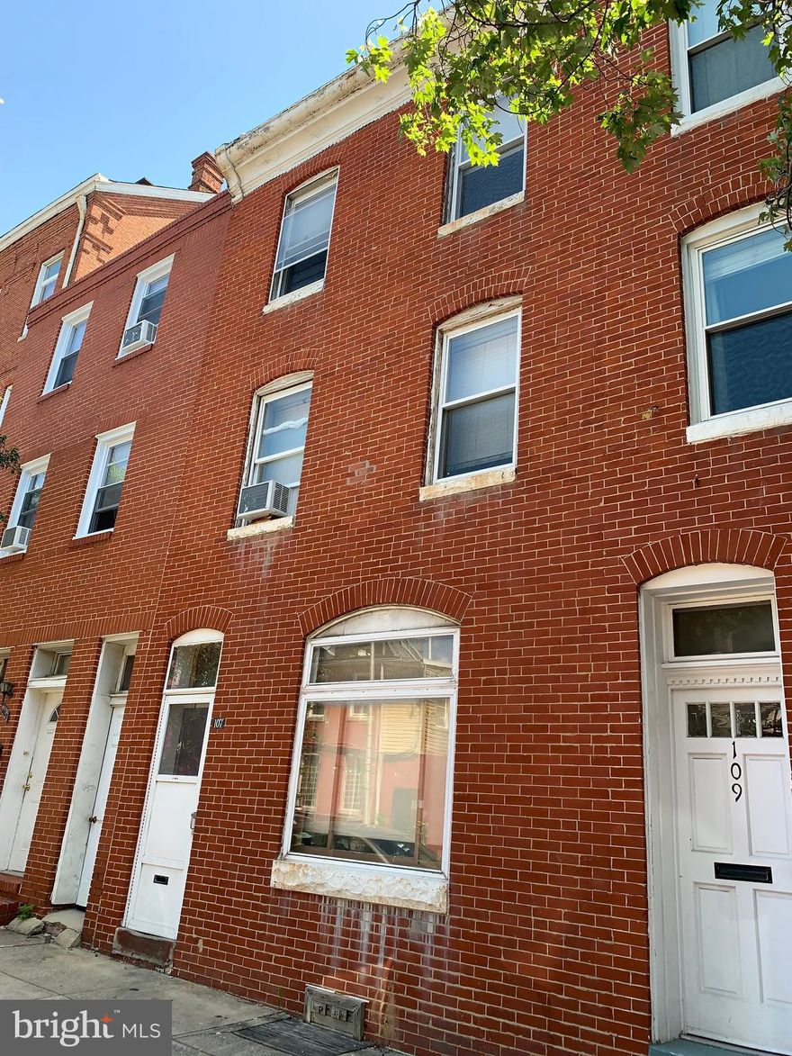 Investment opportunity in Upper Fells! Large 3 story unit, large outdoor area in rear and unfinished basement. Needs full reno. Contact agent for showings and more photos