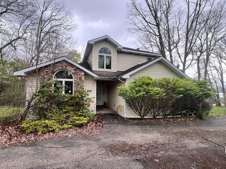 REDUCED -  All the amenities of Deep Creek Lake without at a good price – Very convenient to recreation, conveniences and amenities - A quiet residential pocket just off the heart of Deep Creek Lake’s northern corridor - Pysell Road is a smaller connector, used mostly by residents and short term renters, not through traffic - despite being near the lake’s busiest amenities, the immediate street environment feels peaceful and residential.
Built in 1991 and cited on nearly an acre (0.81 acre).
Upper level (with easy access by stair lift) boast a primary Bedroom with on suite bath, and 2 more bedrooms and another bath on same upper level. 
Main level has all the normal room plus half bath, Family room, entry foyer, mudroom with washer/dryer hook up (with access to nice sized side deck), and a room that could be your study or other use.  Nice features include tile floors (foyer, baths and kitchen), recessed lighting and some wood flooring.  
Lower level has great sized recreation room with wood-burner, full bath, and room perfect for 4th bedroom.  Easy access to rear patio.    
Good value for a detached home Deep Creek Lake area.  
Sold as-is.