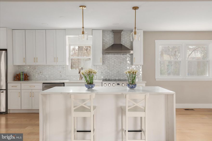 **NO HOA**SHORT WALK TO W&OD Trail**EV Ready Garage with NEMA 14-50 outlet**
Welcome to this beautiful and cozy home in the heart of Vienna! This charming home is the perfect blend of comfort and style. This spectacular home sits on a quiet cul-de-sac, has great curb appeal and is truly move-in ready. 

Main Level: an open floor plan seamlessly connects the living room, dining area, family room and gourmet kitchen creating an ideal space for entertaining and daily living. The kitchen boasts ample white shaker cabinets, a large quartz island with built in microwave, and stainless-steel appliances. The kitchen door leads out to a deck and patio with views of the private backyard and lots of space for outdoor living.

Upper Level: the upper level offers a large primary suite featuring a spacious walk-in closet plus another bonus closet and both have been upgraded to maximize space. The primary suite also boasts a luxurious en-suite bath with a double vanity and a walk-in shower. Three additional bedrooms and a hallway bath with dual sinks and private shower/toilet room ensure comfort and privacy for all.

Lower Level: the basement features a spacious entertainment area complemented by a contemporary wet bar with dishwasher and wine fridge—this space is perfect for hosting gatherings, celebrations, or simple movie or game nights at home.  A private bedroom and a large full bath make this space ideal for overnight guests or accommodating extended family. 

Outdoors: the large two car garage contains as second refrigerator (if desired) and an EV charger outlet.  The large, fenced backyard features an expansive deck and large patio - a perfect space for enjoying warm summer days with family and friends or fabulous space to allow your pet(s) to live their best lives. The shed conveys in "as is" condition.

 Take a stroll around the neighborhood and meet and greet your neighbors. No HOA! Welcome home!