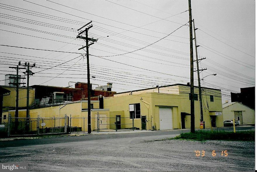 30,000 Sq.Ft Comm Building on 2 Acres. Located near other commercial activity. Easy access, with off street parking. Current/ Investment: partially leased:  *3 SPACES AVAIL: (1) 4000 sq ft. (2) 4100 sq ft. (3) 3200 sq ft.  Opportunity for the "Investor With Foresight". MANY multi-uses for 8000 sq ft.  Leases/Rent Avail: *WAREHOUSE  4OOO sq ft=Truck Dock, Office, Utilities, Bath $2,500 mo.  *WAREHOUSE/GARAGE 3,000 sq ft=Office, Utilities, Bath. $1,800 mo. Call for more details.