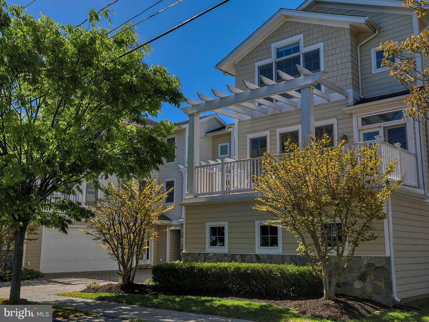 Rarely available 4BR, 4BA luxury townhome in the center of REHOBOTH BEACH.  Less than three blocks to the Ocean, Boardwalk, Restaurants &  Shops  on THE AVENUE.  Park in the 2 car garage & walk to everything.  Lots of upgrades, granite, hardwoods, tile, jacuzzi tub & outdoor shower.  SUMMER FUN AWAITS.  Never rented, rental potential $5500 /wk for10-12 wks.  Common Fee includes Master Insurance & lawn/landscape maintenance.   Offered FURNISHED.