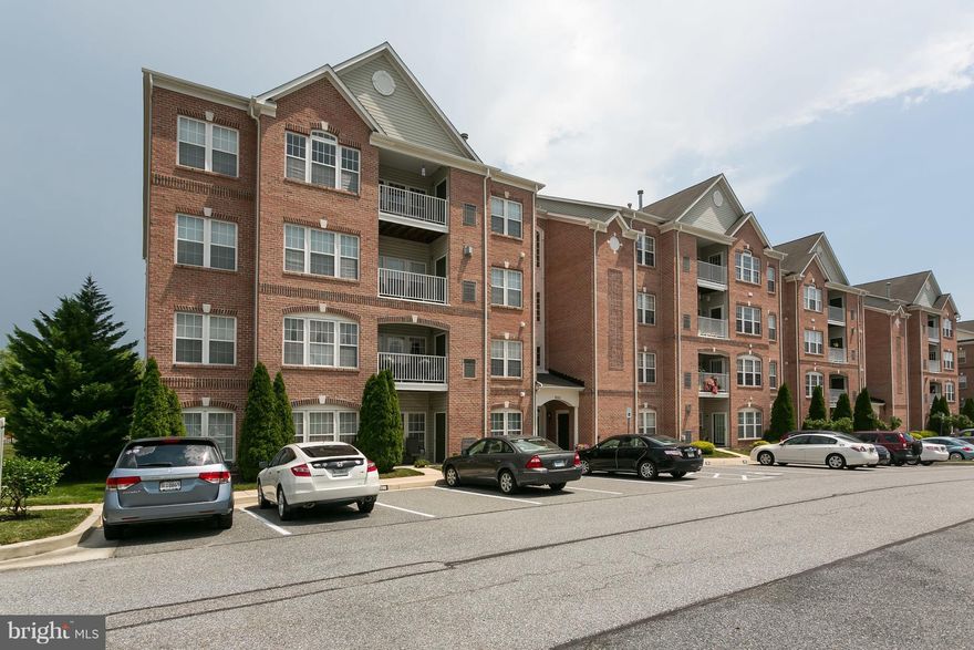 Bright and inviting top floor condo living.  Vaulted ceilings throughout make this expansive living space even bigger.  Very quiet with cozy gas log fireplace.  Entertaining flow from large kitchen to the living area and separate dining space. Immaculate and extremely well maintained. Upgraded kitchen too.  Walking distance to Honeygo Town Center, Honeygo Park and Gough Park.