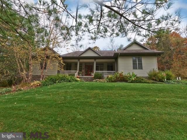 This bucolic Mini Estate offers peace & Tranquility in a convenient S.C. location. The exterior rear patio is expansive w/a covered porch area, gas fire pit, fountain area & maintenance free fencing (also 2 separate pkg areas). Walk through the front portion to an open style living area w/gas fireplace, cherry built-ins & expansive windows to admire the view. Nearby is the gourmet style kitchen w/5burner gas range, warming drawer, silverware drawers, prep island w/sink, pantry. The MBR wing has a private library w/access to the rear patio, cherry built-ins & wine cooler plus gas fireplace. In addition to 2 WICs, there's a tray ceiling, sitting area & Fr. Doors leading to outdoor spa. The MBath has a huge tile shower, separate cherry vanities. All baths have towel warmers & all BRs have ceiling reading lights. Going to the walk out LL: ample storage rooms, 2nd kitchen/bar area, large entertaining area, & 5th BR & bath. Visit www.StateCollegeMiniEstate.com for more information!