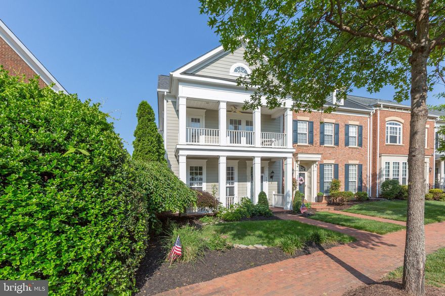 Gorgeous townhome in Belmont Bay! Double front porch, end unit with private fenced patio area off kitchen. Open floorplan with hardwood flooring, kitchen with large island and cozy family room fireplace.  Huge primary suite with fireplace, tray ceiling and huge closet, ensuite bathroom with separate shower and large soaking tub. Amenity rich community features a pool, marina, trails, planned events and more.  Great commuting options with the VRE and I-95 just minutes away.