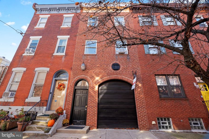 This fantastic 4 bedroom is definitely not a cookie cutter home with its very unique layout and design! This home would be perfectly suited for someone looking for lots of character and very flexible space. This one-of-a-kind property features a garage and amazing outdoor space! Located on a picture-perfect, tree-lined street in the heart of Fairmount—just steps from all the amazing restaurants, cafés, and shops along Fairmount Avenue and the Parkway! Truly bursting with character and charm, this home features beautiful hardwood floors, exposed brick, and an open main level perfect for entertaining. The stylish kitchen with granite countertops overlooks an incredible extra-large fenced yard—your own private outdoor oasis in the city! Upstairs, you’ll find two spacious bedrooms on the second floor and a bright, open third floor with two additional rooms ideal for a home office, guest space, or creative studio. Enjoy two full baths, a large tiled foyer, loads of natural light from side windows, and a private deck off the third floor. And yes—a garage! Perfect for a compact car, bikes, or extra storage. This is a rare find combining historic charm, flexible living space, and unbeatable location. Come fall in love with this Fairmount treasure today!