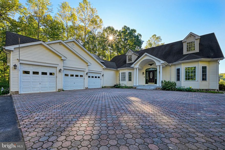 Come check out this well-loved home that has so much to offer! The owners hand laid every brick from the driveway to the boathouse! The lawn has been meticulously cared for over the years. To keep the cost of owning this home down, the owners installed solar panels (which are fully paid for). The electricity generated from the solar panels are sold back to the power company, offering you free energy and sometimes a PAYCHECK! If the power ever goes out, there's a Generac whole-house generator to get you through. When you need to wind-down from a long day, you've got plenty of options to help you. You can head down to your amazing, screened in boathouse and enjoy the lake or you can enjoy some time in your cedar wood sauna. This is a great home for entertaining! There's a large deck on the back of the home, a flat yard for games and gatherings, and of course... that boathouse!

Shorewood is conveniently located on the public-side of Lake Anna, less than 1 mile from Food Lion. Contrary Creek is located mid-lake, making it convenient to boat to all of the restaurants, hang-outs, and entertainment on the lake.