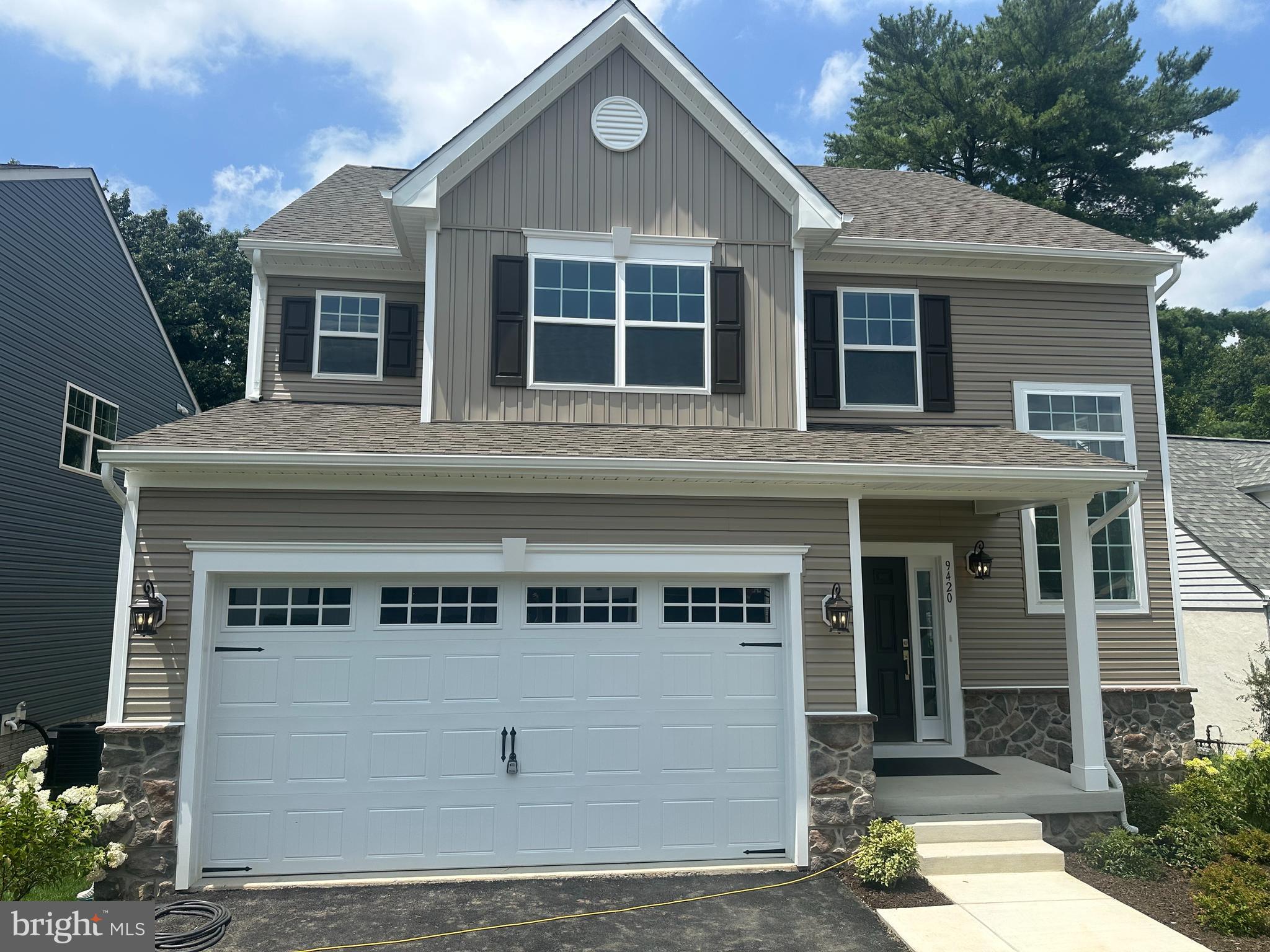 Brand New 5 Bedroom 3.5 Bath craftsman with 2 car garage. Dreamy kitchen with walk-in pantry, large breakfast island, soft close wood cabinets with Quartz countertops. A full complement of SS appliances with designer Hood Vent (vented to outside). Fairview Woods is Cornerstone Homes' new development in Southern Howard County. Minutes to major Rts I95, 32, or 29. Convenient to FT MEADE/NSA, JHUAPL and BWI. A short distance to Laurel, Burtonsville or Maple Lawn for shopping and restaurants. This wonderful enclave of homesites are located on a cul de sac backing to the High Ridge Parkland and Patuxent River. Majestic trees in the wooded parkland and a small creek running to the river, is the backdrop setting for these beautiful homesites. Walking distance to High Ridge Park with trails, tennis, pickleball, tot lot and other rec facilities. Our first home ready is 9420 featuring a Claremont model. This home has a light and airy floor plan with extra large windows added throughout and plenty of recessed lighting. Modern design with special features include board and batten accent siding, partial stone exterior, with a covered front porch. Inside the builder included a finished lower level with 9' ceilings, a 5th bedroom, a 3rd full bath and a true walk-out slider to the rear yard. Additional Features worth noting are the premium trim package (Main Stairwell, Great Room and Flex Room) and the designer vanity cabinet in the first floor powder room. All the flooring is upgraded; including LVP throughout the main level and stairs up, upgraded pad in the upper and lower carpeted rooms. Deluxe Tile Package in the baths and a tiled backsplash in the kitchen. Primary suite with huge walk in closet, cathedral ceiling and windows with a beautiful wooded view. The En-Suite Bath features a luxurious tiled shower with glass doors, double vanities and a double door linen closet in the bathroom. Upper level laundry room is a wonderful convenience. Oversized, low maintenance Trex deck is already installed for your backyard enjoyment. Spacious 2 car garage with paved driveway has room for 4 cars. Electric rough in for EV cars is included. NO HOA and NO Front Foot Fee. Contact builder for details of an exclusive incentive package (w/ the use of Builder's Preferred Lender & Title Company). Showing times are limited until the home is completed. Showings/tours only during the weekdays Mon-Fri 8am-3pm. Call us for your private tour or to arrange an appointment with the builders rep.