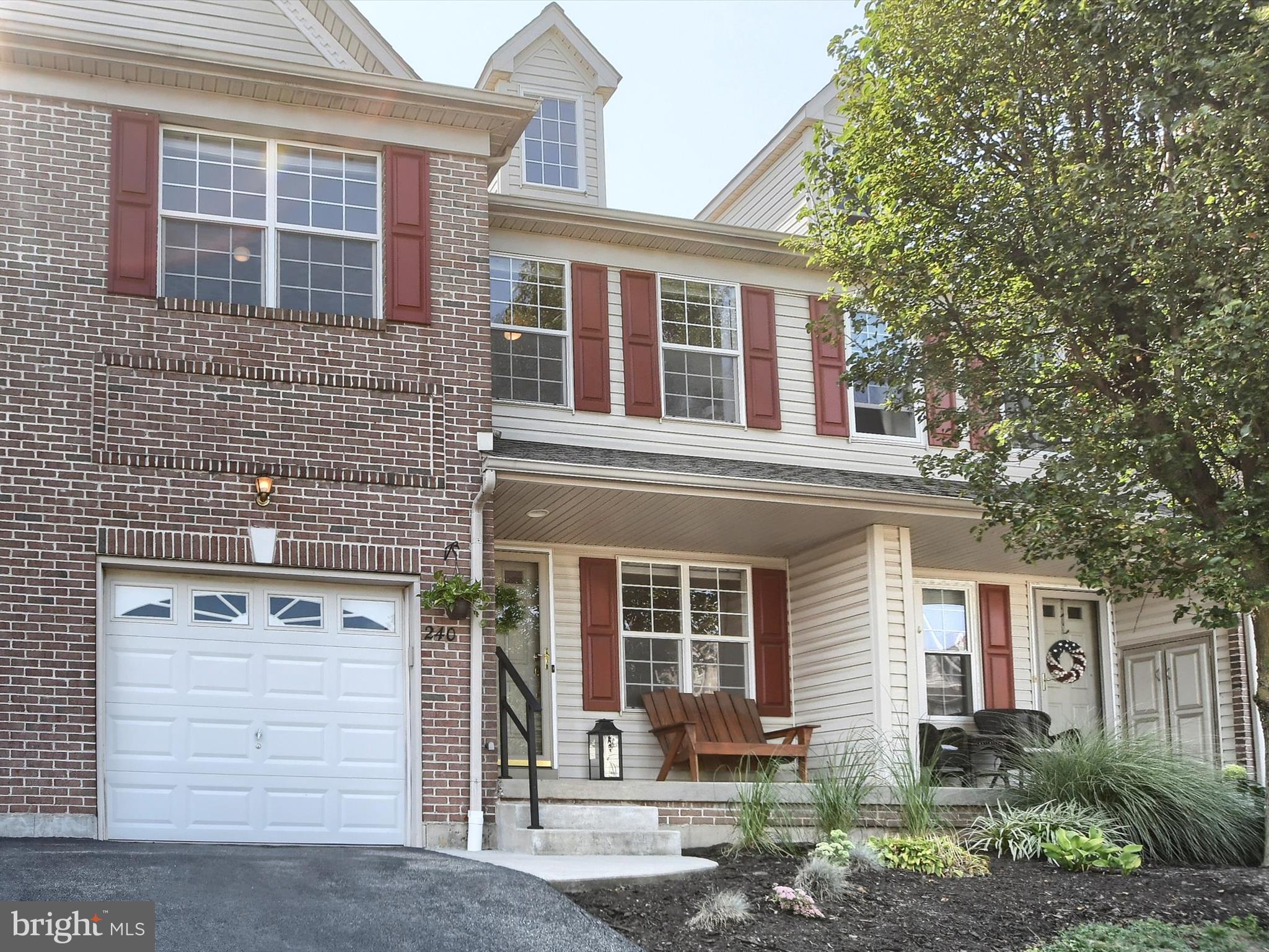 Located in Hatfield Borough in North Penn School District, this beautifully updated 3-bedroom, 2.5-bath townhouse offers comfort, functionality, and modern touches throughout.
As you enter, you're welcomed by a spacious formal living and dining room combination, ideal for both everyday living and special gatherings. Beautiful hardwood floors guide you into the bright, open two-story family room, where soaring windows with remote-controlled blinds create a dramatic and inviting space. The well-appointed kitchen offers ample cabinetry and counter space, with a layout that keeps it connected yet distinct from the main living areas. Step outside to a private deck backing up to mature trees—a perfect spot to relax or entertain in peaceful surroundings. Upstairs, you’ll find brand-new carpet throughout, as well as an updated railing and spindle design that adds a fresh, modern feel. The spacious primary suite features a private en suite bathroom complete with a soaking tub, while the convenience of second-floor laundry adds to the home's thoughtful layout. The finished basement is a true bonus—featuring a home theater setup with projector and screen, plus a built-in bar, creating the ultimate space for entertaining or unwinding. With an attached garage, plenty of storage, and easy access to major routes, Heritage Park walking path, pond, and playground within walking distance, shopping, and dining, 240 Larkspur Lane is move-in ready and waiting for you. Schedule your private tour today!