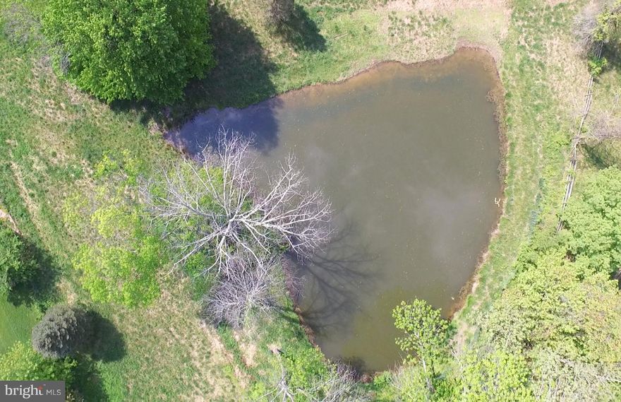 Pond, Barn... Zoned RC-2. 2 separately described parcels of approx. 9 & 20 acres each +/-. Descriptions pre-exist 1979, date of RC-2 Bill Enactment.  Believed to be 4 density units HOWEVER-Buyer to Perform All Due Diligence For Any Subdividing using their own experienced engineer/attorney, etc. As Is.  Buyer pays any Ag Tax. Info deemed reliable but not warranted. DO NOT ENTER STRUCTURES!
