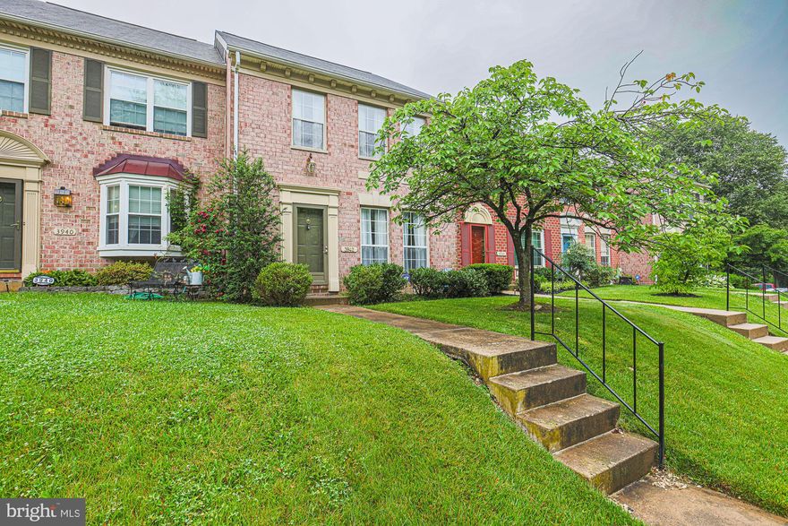 DESIRABLE CROMWELL STATION townhouse backs up to a flat, tree-lined area of Loch Raven Reservoir. Walking into the main level your eyes immediately take in the  gleaming HARDWOOD floors and recessed lighting brightening the natural sunlight.  Heading into the  BEAUTIFUL, GOURMET kitchen: the  soft close cabinets, quartz counters and an additional built in cabinet storage area invite you to create culinary feasts! All THREE BEDROOMS on the upper level have ceiling fans and wall to wall carpet. The PRIMARY Bedroom includes a private en suite bath with stall shower. The remaining TWO Bedrooms share a hall bathroom. Relax and unwind in the finished lower level where the stone corner fireplace draws you in. Sliding doors open to the patio and the tree-lined grassy field.