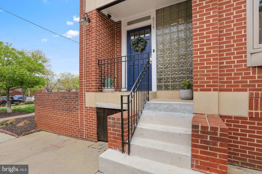 First showings- Saturday, April 23rd by appt and Open 12-1:30 Sunday April 24th. Grindall's Yard is a well established 18 home community located in the heart of the Federal Hill Historic district.  Blurring the lines between urban and suburban living with beautifully landscaped open space and every house backing to a European style mews, a canopy of trees, individual patios and gardens while still only steps from restaurants, markets, one of a kind specialty shops and entertainment plus a short walk to stadiums, light rail and national attractions. 
In addition to off street parking this timeless, EOG townhome features a thoughtful modern floor plan while maintaining it's distinct individuality. Side windows provide extra sunlight by day and sunset views by evening. Main level kitchen with breakfast room, powder room, spacious dining and living areas that flow seamlessly from one to the other are complemented by french doors, wd burning FP, oak floors and built-ins. Upper level has three bedrooms, primary and secondary full baths and a huge walk-in closet. Lower level is a very large room with full bath that can function as a secondary living room, office, guest room or combination of all. Utility room provides generous storage and laundry facility. Last two houses on the block sold for $539K and $519k. 210 Grindall is priced to allow for some bathroom updates. Do it your way and add some equity.