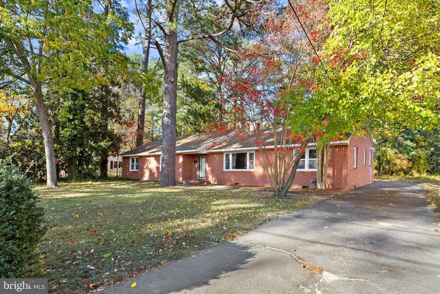 Spacious All-Brick Home Near Salisbury University – No City Taxes! Welcome to this beautifully maintained all-brick residence nestled in a quiet, desirable neighborhood just minutes from Salisbury University. Boasting over 2,600 square feet of living space, this 4 bedroom home offers comfort, charm, and convenience. 
Step inside to find gleaming hardwood floors throughout, a masonry brick fireplace, and built-in shelving that adds character and functionality. The formal dining room easily accommodates a 10-seat table—perfect for entertaining.
Enjoy cooking in the updated kitchen featuring natural gas cooktop, all new stainless-steel appliances, and appreciate the ease of a separate utility room for laundry and storage. Each room in the home is generously sized, offering plenty of space to spread out.
Additional highlights include:

Attached two-car garage
Paved driveway
Efficient gas heat and central air new in 2017
City services with no city taxes
Sunroom/breezeway perfect for exercise room or office

This home combines classic style with modern updates in a prime location. Don’t miss your chance to own this spacious gem!