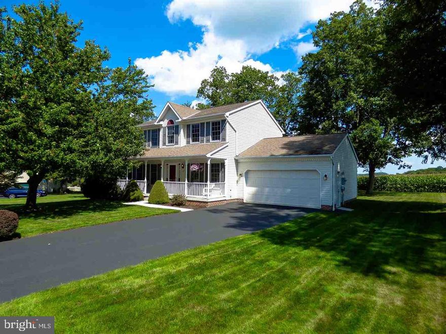 Don?t miss this beautifully cared for & maintained, move in ready, 2 story colonial on a level lot w/mature trees backing to farmland!  2 car gar w/storage above, full frnt porch, 20x20 rear brick patio, mbr w/sitting rm, mba & wlk in closet!  Sep DR, Sep LR & open FR next to bright eik,  Tons of storage in unfin bsmt, all appli includ, 1 yr home warranty, Impeccably clean!
