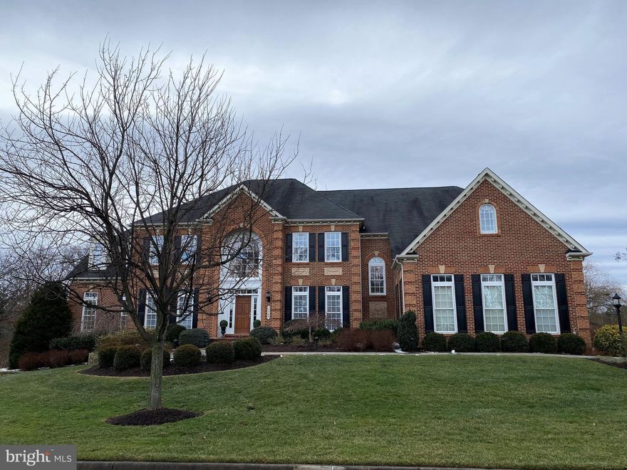 Stunning light filled NV Mount Vernon model with 8 bedrooms, 6.5 bathrooms, 2 home offices, 3 car side-loading garage with charging station located in the sought after Cedar Hunt subdivision. This amazing home has 9’+ ceilings on all levels.  This Center Hall Colonial has a grand two story foyer, double staircase, back stairs to upper level, formal living & dining room, loads of custom wood decorative moldings, hardwood floors, side sun room with private deck and stairs to lush yard, library, family room with double sided gas fireplace that passes through to the beautiful chef’s kitchen granite, island, and upscale stainless steel appliances, eat in kitchen space and a cozy informal breakfast room that could also work as a second family room. The kitchen walks out to a massive maintenance free deck with lighting, stairs to grassy yard backing to open area and trees, and a huge, screened porch with ceiling fan and outdoor TV. With 6 spacious bedrooms & 5 full bathrooms on the upper level, including a huge primary bedroom with coffered ceilings, sitting room, walk-in closets, and an amazing spa-like Tuscan luxury bathroom with soaking tub, walk-in shower, double vanities, and custom tilework. Three additional "junior suites" with private bathrooms + 2 more additional bedrooms, each with walk in closets, sharing a well-appointed jack and jill bath. The finished walk out lower level has a large recreation room with granite topped wet bar, full size refrigerator, sink, dishwasher and beautiful wood cabinetry, spacious media room, 7th legal bedroom with walk-in closet and full bath, second bedroom that would make a great home office, and plenty of storage space. This amazing professionally landscaped lot is .64 acres has irrigation, lighting, sides & backs to acres of parkland that won't be developed.