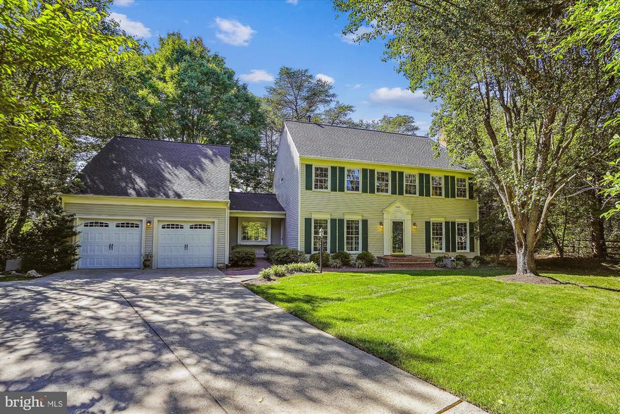 Welcome Home to this lovingly maintained 4 bedroom/3.5 bathroom home on a quiet .47 acre lot! Beautiful curb appeal! As you enter the home through the new front door, you will love the wide-open space of the generously-sized foyer. To your left is the main level office with double doors for added privacy.  Off the foyer is a combination living room and dining room. The living room has an elegant wood burning fireplace (one of two in the home!) and beautiful trim work which you see throughout the home. As you enter the kitchen, the first thing you will notice is the expansive windows and view to the wooded lot that just draws you in. The kitchen has granite counters and backsplash, a brand-new double oven, and a newer refrigerator, large pantry, a Butler’s pantry with a second sink and plenty of seating at the peninsula. The kitchen is open to the family room with a vaulted ceiling, a second wood burning fireplace and custom shelving unit that conveys (hand built!).  Off the family room is a screened-in porch that will be your favorite spot, complete with a fan and lighting and a serene view of the wooded lot.  Additionally, off the family room is a door to a large deck with tons of space for grilling, dining tables and additional seating. 

The stairs to the upper level and the landing are all hardwood. Upstairs features four bedrooms (all with BRAND NEW CARPET) and 2 full bathrooms. The primary bedroom has a large sitting room which can also be used as second home office, a gym or a nursery. The primary bathroom features a soaking tub, separate shower and a private water closet. 

The lower level has a full bathroom, a bonus room with a large closet, BRAND NEW carpet throughout, and walk-up stairs to the side yard.   Not to miss is the the large workshop which can be converted to additional living space, a home gym or kept as additional storage.  Updates include Windows (2015), Roof (2022), Water Heater (2016) Carpet (Oct 2023) Double Oven (Sept 2023).   Enjoy all that Virginia Run has to offer including the neighborhood pool, walking and biking trails and lots of community events.  A short distance to Dulles Int. Airport. Close to shopping, I-66, Rt. 28, Rt 29 and Metro Park and Ride.