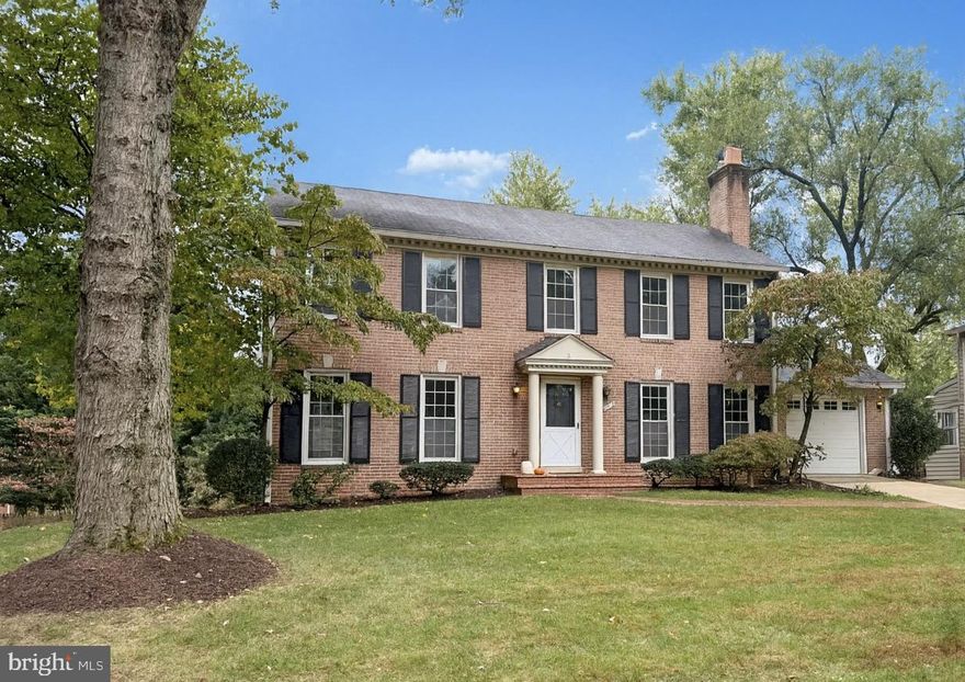 Welcome to this timeless center hall brick colonial, ideally situated on a 9,200+ square foot lot on a tree-lined street in Wildwood Manor. This spacious five-bedroom, two-and-a-half-bath home offers classic charm and a great location!

The inviting main level features formal living and dining rooms, hardwood floors and a family room with a wood-burning fireplace. The table-space kitchen, with its generous pantry and large windows overlooking the backyard, provides a comfortable space for everyday living. A mudroom conveniently connects the attached one-car garage to the kitchen and the main-level laundry includes a laundry chute from the primary bedroom closet.

Upstairs, you’ll find five spacious bedrooms and two full baths, including a primary suite with a walk-in closet. The finished, walk-out lower level offers a large recreation room, along with unfinished storage for maximum flexibility.

Additional highlights include fresh interior paint, replacement windows and the largest Wildwood floor plan. With its off-the-beaten-path location and easy access to shopping, schools, parks, and transit, this home combines classic character, comfort and convenience!