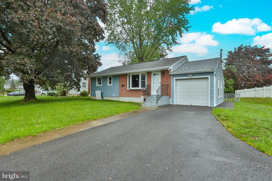 This stylish 3-bedroom, 2-bath ranch blends classic charm with a modern touch—ready for you to call it home! You'll enjoy the hardwood flooring throughout, the comfort of central air, plus the convenience of an attached garage with a pull-down ladder for extra attic storage. Step outside to a spacious fenced backyard featuring a concrete patio and a cozy 4-season sunroom—perfect for relaxing or entertaining guests. This well-kept home offers plenty of indoor and outdoor living space to enjoy year-round!