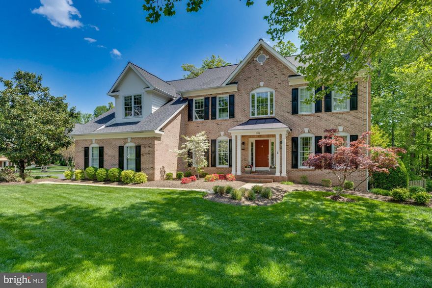 Stunning home in the coveted Manors at Wolf Trap, nestled on a peaceful cul-de-sac with a private wooded 0.35 acre lot. The home boasts a bright and open interior perfect for entertaining, featuring 6 bedrooms, 4.5 bathrooms, and offering 5,557 sq ft of living space over three levels. The layout is ideal for large or small gatherings, including a grand two-story entrance hall, formal dining and living rooms, and a family room with a cozy fireplace. The kitchen shines with its central island, granite counters, custom tile backsplash, walk-in pantry, and a breakfast nook beside a sunroom with vaulted ceiling. The main level also boasts a home office, a mudroom/laundry, and a half bath. The owner’s suite is a retreat with its own fireplace, sitting area, dual walk-in closets, and an spa-like bathroom featuring a soaking tub and a walk-in shower enclosed in frameless glass. The upper level also has a walk-in linen closet and four additional bedrooms, connected by two Jack and Jill baths. The finished walk-out lower level offers a recreation room, home gym, full bath, and the sixth bedroom. Private park-like exterior, complete with a spacious low maintenance Trex deck and a beautifully landscaped, fenced yard that backs to protected woods. Conveniently located a short drive from Vienna's downtown, Tysons, Wolf Trap National Park for the Performing Arts, major commuting routes, and the Metro, within the Westbriar/Kilmer/Marshall pyramid.