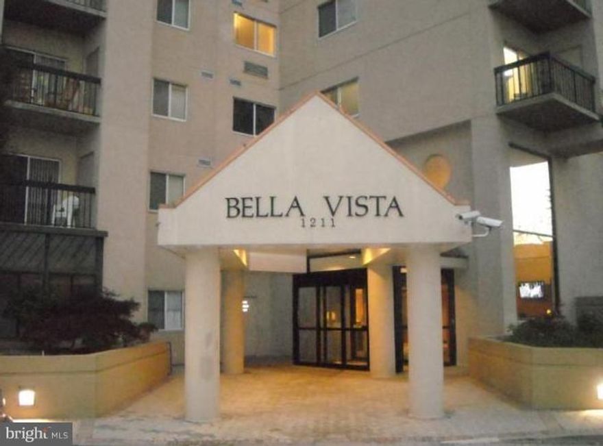 Updated Bella Vista Condo with hardwood floors in open living/dining room. Kitchen w breakfast bar, wine fridge and Corian. Monument views. 2 large bedrooms. 2 Full tiled baths. Large closets, plus washer/dryer in unit. 1 reserved parking space, 24 hr desk, party rm, pool, gym, CC metro 2 blks. All utilities included!