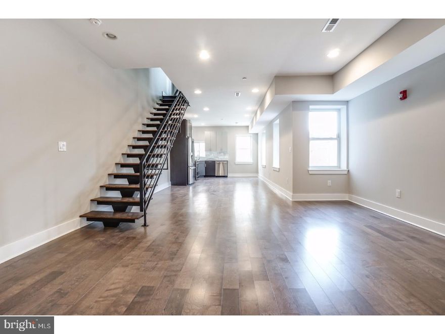 Welcome to 2512 Frankford Ave!  Four spectacular Bi-Level Condos completely renovated throughout.  Unit "C" Main Level features an airy floor plan with plenty of natural light, spacious Living/Dining area, open staircase, contemporary Kitchen with quartz countertop, marble tile backsplash, five burner slide-in gas range, counter depth refrigerator, and hidden control dishwasher.  Upper level contains master bedroom with walk through closet, ultra modern master bath with stall shower, hall laundry,and guest bedroom with private bath. Huge roof top deck with wonderful city views.  Tax abatement approved. Great location! 94 Walk Score. Convenient to Philadelphia Brewing Co, Martha, Memphis Taproom, Pizza Brain, and much more! Easy to show!