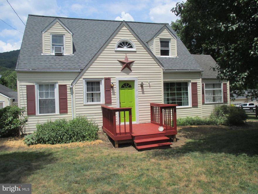 YOUR HOME AWAITS YOU. BEAUTIFUL 3 BR 1-1/2 BATH HOME ON LARGE LOT.  ALL OAK KITCHEN WITH EAT-IN AREA AND SEPARATE DINING ROOM. MAIN LEVEL BEDROOM, LAUNDRY ROOM, AND 1/2 BATH. FULL BASEMENT COULD BE FINISHED INTO ADDITIONAL LIVING SPACE. OUTSIDE FEATURES A NICE LARGE REAR DECK WITH BEAUTIFUL MOUNTAIN VIEWS, SIDE PORCH, FRONT PORCH AND 3 CAR DETACHED GARAGE WITH WALK OUT DOOR. COME SEE THIS QUAINT COUNTRY HOME JUST MINUTES TO PETERSBURG. YOU WON'T REGRET IT.
