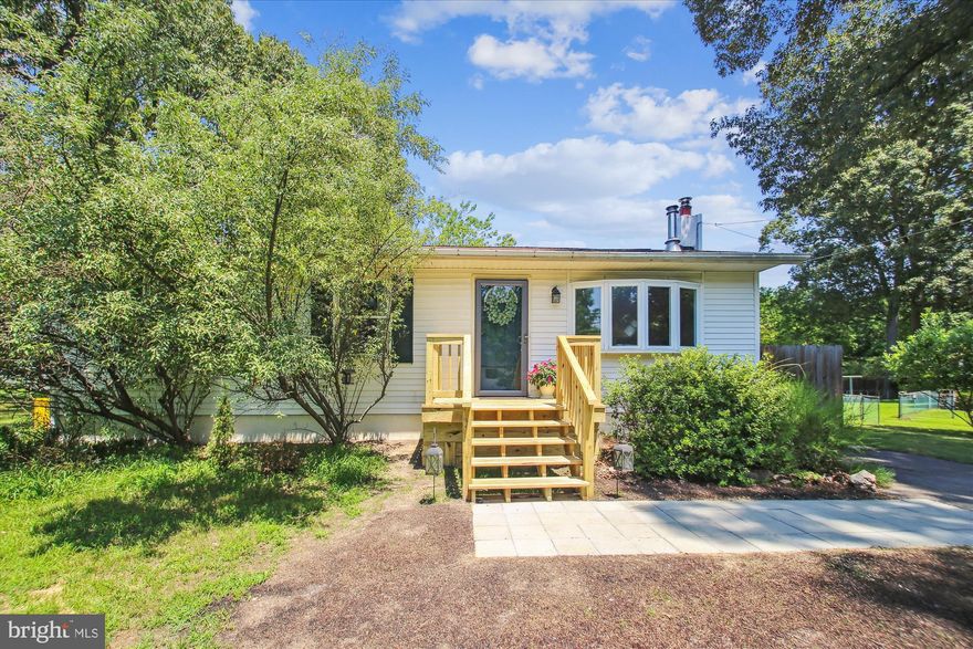 Welcome to this 3-bedroom, 2.5-bath rancher nestled on a quiet and private 0.4-acre lot in the desirable Long Point community. Enjoy outdoor living with a brand-new front porch and rear deck—perfect for relaxing or entertaining. The kitchen is conveniently located just off the deck, making outdoor dining and gatherings a breeze. One of the standout features of this home is the large 4-seasons room with vaulted ceilings, offering beautiful natural light and year-round enjoyment. The lower level includes a full bath and an additional room that could serve as an office or guest bedroom. A great opportunity to make this home your own in a water-privileged neighborhood.