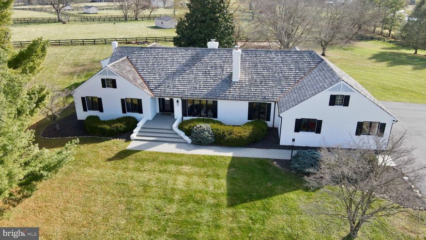 Welcome to this exquisite 3200+ square foot all-brick one-level home, situated on 10 fenced lush acres in the highly coveted community of Atoka Chase, Middleburg VA. This meticulously crafted residence boasts an open floor plan with wide doorways and accessible rooms, designed to elevate everyday living and a gorgeous indoor pool.

Entertain guests in the formal living room, complete with a striking wood-burning fireplace, perfect for cozy gatherings on chilly evenings. The kitchen beckons with its inviting sitting area, ample space for a table, stunning cabinetry, and modern stainless-steel appliances. Adjacent to the kitchen is an expansive mudroom adorned with marble tile floors and built-in cabinetry, offering both functionality and style.

The thoughtfully designed 2-wing floor plan ensures privacy, with a Primary bedroom Wing secluded from the two additional bedrooms and full bathroom.

Retreat to the large primary suite, featuring an expansive bath with a soaking tub, separate shower, and a massive walk-in closet with a dressing room area, providing a serene sanctuary for relaxation. 

This home also boasts a dedicated workout area and home office, providing the perfect balance of work and leisure.

Indulge in the luxury of an indoor heated pool, with four sets of sliding glass doors that open to the backyard and custom patio, offering year-round enjoyment and entertainment opportunities.

Residents of this well-maintained community can enjoy access to a 50-acre preserve with trails bordering scenic Goose Creek, providing ample opportunities for outdoor recreation and exploration.

Don't miss the opportunity to experience the epitome of luxury living in Middleburg VA. Schedule your private showing today and discover all that this exceptional property has to offer. This is truly a MUST SEE!