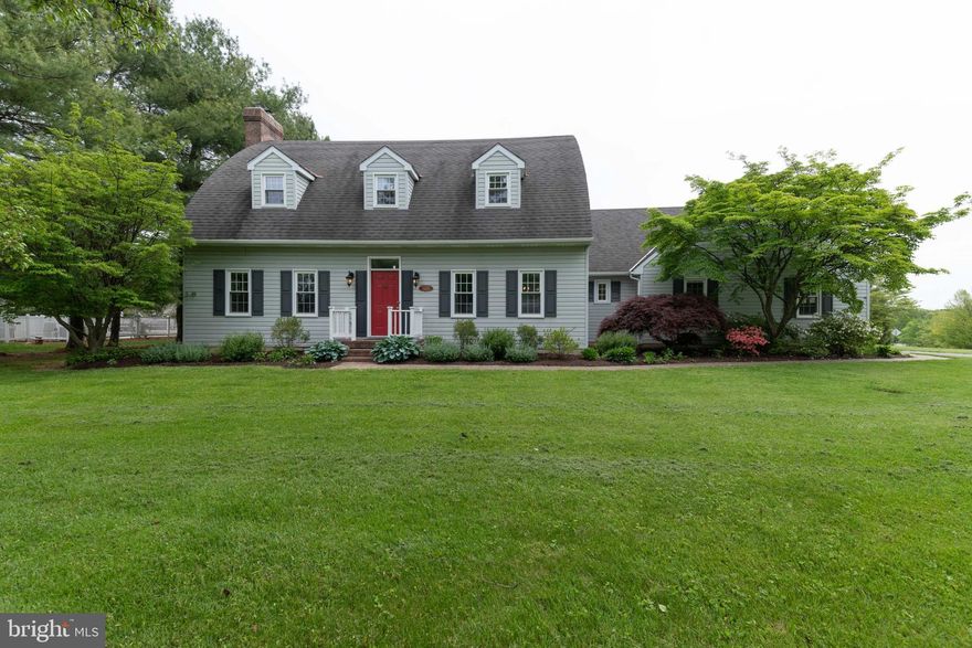 Custom Built Cape Cod with Spacious Center Hall Floor Plan on a flat open lot.  Freshly painted throughout with beautiful woodwork and trim. Updated Kitchen with custom built Island, wood cabinetry and hardwood floors.  Adjacent Family Room with raised hearth Fireplace with Woodstove Insert and glass slider to the backyard.  Sunroom is off kitchen with Cathedral Ceiling, lots of sunlight and access to side patio and yard.  Three generously sized bedrooms upstairs with spacious closets and two full baths. Finished Lower Level with Rec Room, Workshop and Storage.  Oversized two car garage with an additional space for lawn equipment.  All this in a wonderful Country Community!  EZ Commute to 83 and Hunt Valley.