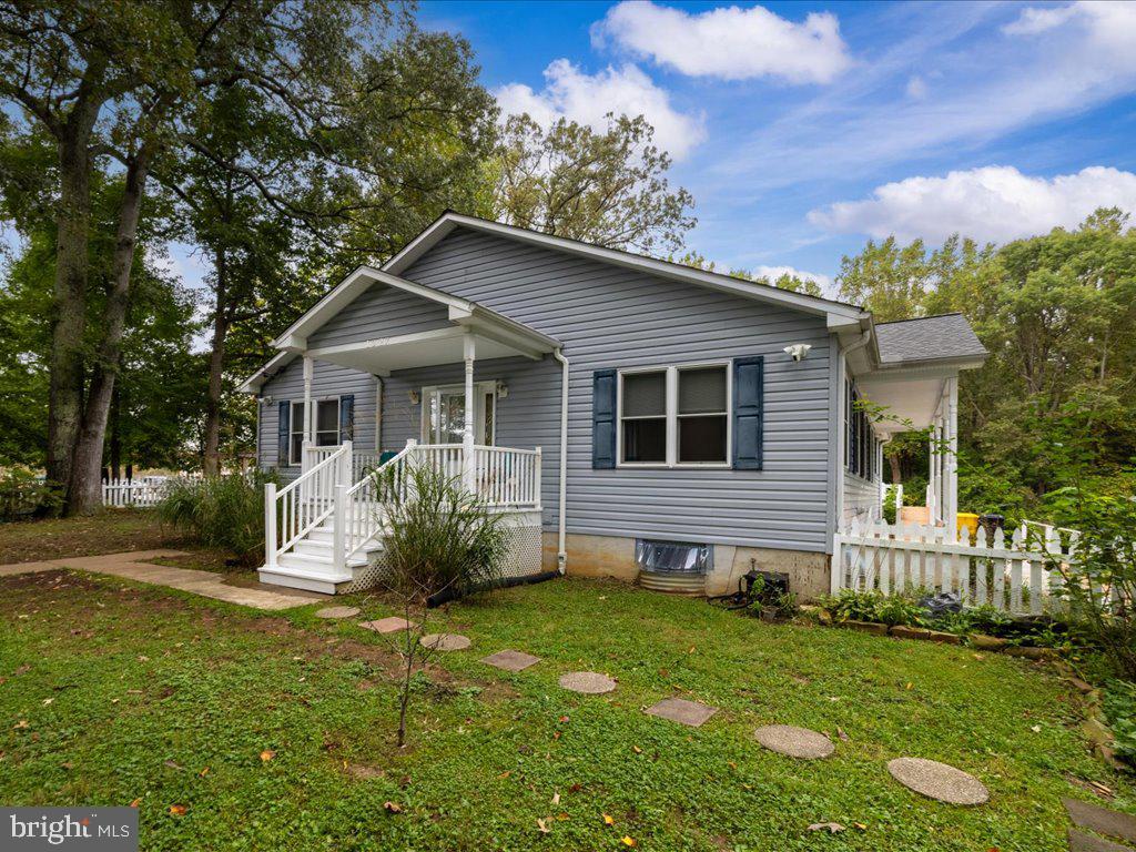 PRICE REDUCTION in Crownsville-- this one is a rare find! Four bedroom, four full bathroom raised rancher on over an acre of beautiful land! Three of the four bedrooms have attached bathrooms, tastefully updated! Upstairs you will find the master and second bedroom, as well as a hallway bathroom and lots of open space and natural light. The updated kitchen is wide open with dining space and bonus mud room leading to the rear deck. The master bathroom has a walk in closet, bathroom with oversized soaking tub and walk in shower, and also has french doors providing additional access to the rear deck. The lower level is newly renovated! Two bedrooms each with attached bathrooms, and both are very spacious. Bonus living area, space for wet bar or any entertaining dreams you can muster up! The walkout stairs lead back up to the large yard with multiple outbuildings. You won't want to miss this- schedule a showing today!
Home was lovingly updated and upgraded- See below for list:
New Roof August 2021
New HVAC system with smart thermostat August 2021
New soft water/filter system August 2021
New washer and dryer September 2021
New constant pressure system & well pump August 2021
New hardware, door handles and locks. 3 of the 4 entry points are smart locks August 2021
New outlets and switches: Majority of the house being Lutron Caseta smart switches. August 2021
New Toilets and bathroom fixtures August 2021
New ceiling fans and lighting fixture Ausust 2021
New under cabinet lighting in the kitchen. August 2022
New Fridge August 2021
New dishwasher 2022
New stove August 2023
Basement bedrooms and bathrooms redone early 2023
New sewer injector pump April 2024
Septic pumped out and inspected October 2023 1250Gal tank
New Ring cameras, one on each side of the house. September 2021
