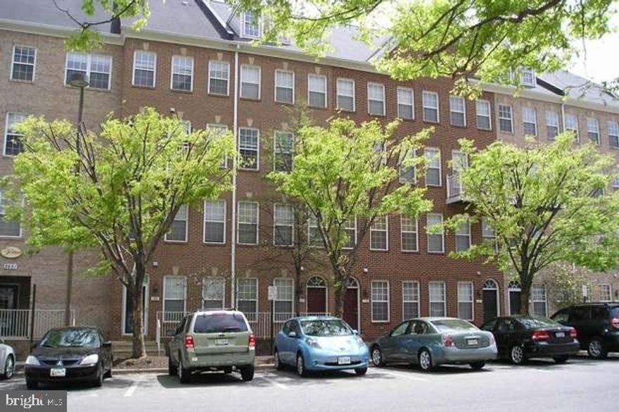 Amazing location across the Dunn Loring Metro (Harris Teeter, Starbucks and more), within walking distance from the Mosaic District where you will enjoy shopping, dining, entertainment and a quick commute to Downtown DC, Tysons, Vienna etc... This 2 bedroom 2 level townhouse offers an open living room/ dining room with large windows, a kitchen with gas cooking and an attached family room with gas fireplace, built-in bookshelves and a rear balcony.  The upper level offers a large walk-in laundry room with full size washer and dryer, a large primary suite with walk-in closet and a large spa bath with soaking tub and separate shower. The guest bedroom features a private guest bath and full walk-in closet with a private balcony. 1 underground garage parking space and 1 assigned space included, as well as guest permit parking pass.
Beautiful hardwood floors on the main level. Townhouse was just painted.