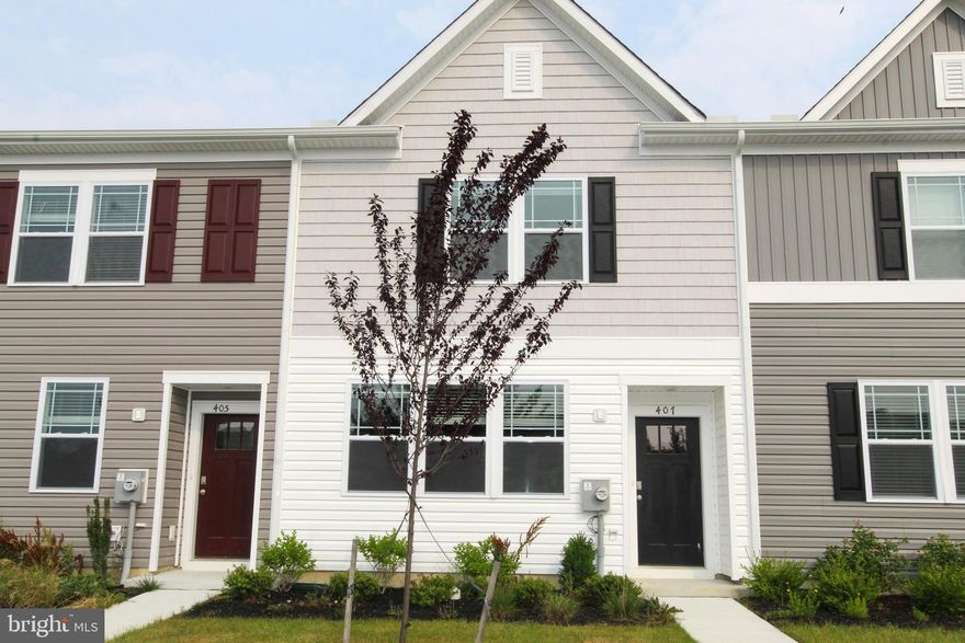 Don't miss your opportunity to own new construction at this price point! This move-in ready two story townhome is located just minutes from Downtown Cambridge's many amenities  including waterfront dining, museums, golf, parks , yacht club and a boat ramp which provides access to the Choptank River. This property features a spacious living room and kitchen with classic cabinetry and stainless steel appliances. A separate laundry area with washer and dryer included and half bath are also conveniently located on the first floor. All three bedrooms are located on the second floor including a primary en suite with dual sink vanity and walk-in shower stall and a second full hall bathroom. An attic access panel in the second bedroom provides for additional storage. Schedule your private tour today.