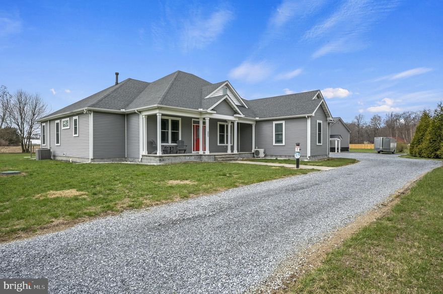 Kent County Country Estate.  Welcome home to 321 Blue Heron Rd, Dover.  This custom-built home by Kevin Yencer, is truly one of a kind.  Located on a 2.6-acre lot in country setting. This 3,019 Squarefoot home with Two Pole buildings does not disappoint.  Front Porch entry way into the Foyer.  To the Left is a formal Living room with French Doors.  To the Right is the formal Dining room.  Large Open Concept Living.  Gas Fireplace warms the Family room, Kitchen with Eat-in area overlooking your private back yard.  The Kitchen is a chef's dream.  Granite Countertops, Stainless Steel Appliances, 42" Cabinets, and Farmhouse Sink. Primary Bedroom Is nicely sized with a ton of natural light.  Large Closets and Au Suite Bath.  The two other bedrooms are on the opposite side of the house with full bath in between.  Each bedroom is large in size and great closet space.  Upstairs there is a bonus room great for man cave or teen hang out.   Screened in porch just off Family room.   Outside is a great entertainment space.   Wonderful Patio overlooking back yard.  Fire Pit Area, Grilling Area  and Basketball Court.  Yard backs to Farmers Field.  Beautiful wildflower Patch and Pond are on the Property.   Two Large Pole Buildings (1 50 X 50 and 1 30 X 30) are also on this property.  Bring your business or ideas for space.  Close to all Dover Has to Offer.  Put this home on your tour list today.