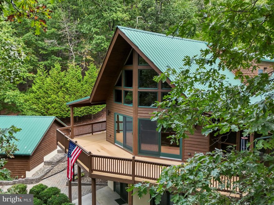 Getaway! Hideaway! This amazing cedar chalet is tucked away among the beautiful woodlands. Setting on 2 lots for a total of 2.3 private acres that adds to the investment potential.  Boasting 3250 square feet of finished living area with -  4 bedrooms and 4 full baths, Huge Great Room with connecting decks that overlook the small valley with the tranquil Indian Run Creek flowing through.  First floor master suite connecting to the private screened porch. Red oak floors; 3 fireplaces; gourmet kitchen; cedar ceilings, exposed beams, accent lighting. Completely finished Lower level with game room. Heated garage with workshop and 1/2 bath, fully finished. Located in prestigious Cacapon South with smooth paved roads and just minutes to the Cacapon State Park for dinning, golf, horseback riding, hiking, swimming, fishing. Many of the working items within the home have been recently updated so all that you need to Enjoy this Peace of Heaven is the keys, make your appointment today!