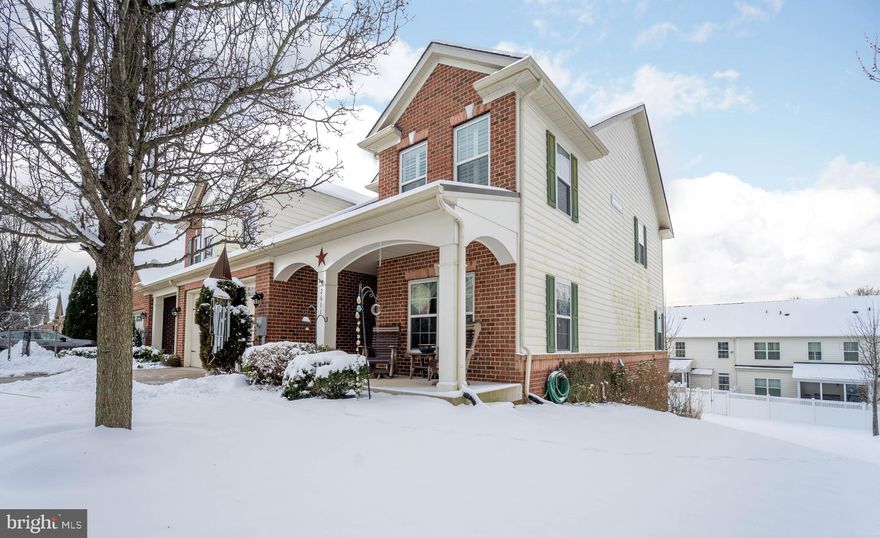 It does not get much better than this.. Active Adult 55+ home and community.  Desirable bright open home with the sought-out upgrades. End-unit townhome/villa with 1st floor primary bedroom with ensuite lux bath PLUS 3 additional bedrooms with ensuite baths.   Main level has covered front porch and zero-entry. Once you enter the 2-story light filled foyer, you will find a formal separate dining room, kitchen with stainless, granite, gas cooking, microwave, large island, and an open family/living room with gas fireplace. Also on the main level is laundry, half bath, and the 1st of 5 bedrooms. The upper level has 2nd primary bedroom also with ensuite bath and walk-in closet and 2 additional bedrooms (1 with attached bath), hall bath and open seating area with storage closet. Daylight finished lower level has bedroom (or craft/office/etc) with walk-in closet and full bath plus, recreation/2nd family room.  Walk out to fenced back yard with landscaping and flagstone patio.  Bonus is a 3-season room off the main floor LR that overlooks the community walking path and conservation side yard.  HOA takes care of the snow (streets and sidewalks) along with the grass, mulch, trash and more. Clubhouse has community/club rooms, kitchen, and work-out room. Community includes walking path, patio and gathering spaces. Close to shopping, major roads, and low HOA fees.