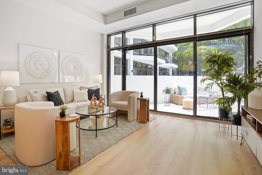 Offer Deadline is Thursday, 5/18 at noon.  Come home to a spectacular and newly renovated 1 bedroom and 1 bathroom condo in one of Arlington's best neighborhoods! Spacious living and dining room with dramatic 11 foot ceilings and wall of windows looks out onto the expansive private terrace, perfect for relaxing or entertaining! Kitchen boasts new quartz counters, sink and faucet (2023), glass front cabinets and microwave (2023), stove (2020) and dishwasher (2020). Bedroom suite includes 2 closets, one of which is a large walk-in with a custom closet system, linen closet, dressing area and updated bathroom with soaking tub.  Condo has LVP floors throughout (2023) and is freshly painted (2023). BEST THING ABOUT IT IS...Garage parking ($30/mos.) , Fios internet ($80/mos.) and extra storage are included in condo fee.   Amenities include concierge desk staffed 24-hours, fitness center, sauna, outdoor pool, tennis courts, dog park and on-site cleaners. Great neighborhood shops, restaurants, easy access to metro, Rt. 66, Reagan Airport, GW Parkway and DC. You will love coming home to this luxury condo!