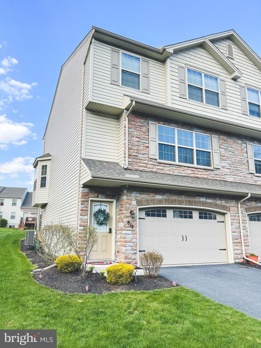 Welcome to Dorset Square in the desirable Winding Hills Community!  Absolutely stunning end unit that shows like a model home.  Extremely well maintained and so beautifully  updated throughout you will fall in love.   The heart of the home features a large,  light and bright living room that flows  right into that gorgeous  kitchen  perfect for entertaining !  Not only is there a  large center island with seating, there is a perfect spot by the bay windows for your favorite dining  table.  Expand outdoors when the weather is right on the fantastic deck   that overlooks  beautiful  green space & sidewalks  that YOU don't have to maintain!   Upstairs features a master suite with  walk in closet & full bathroom with double sinks,  two more nicely sized  bedrooms , another full bath and convenient laundry area WITH the washer and dryer in place!  No carrying laundry up & down stairs!   There is  even more space to spread out in the lower level  bonus room that could be used as a second living room, home gym,   rec room, office,  4th bedroom, playroom...whatever YOU want!  There is SO much to love about this home and this spectacular neighborhood that has  walking/biking paths, a community center, a fitness center, and a HUGE outdoor pool  just steps away.   You will most certainly want to call this HOME!