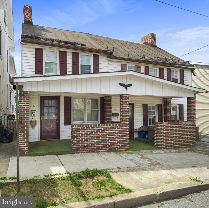 Own a piece of history..Welcome to 40-42 W Salisbury St! Dual Units with dual opportunity. Registered as a contributing home in the national register of historical  places for Williamsport Historical District. 
Each side features approximately 1,200+ sq ft, 2 bedrooms, and 1 full bath.  Maintain as an income-producing duplex or recombine into a single-family residence. Walkable to schools, parks, local shops, restaurants, and just minutes from the scenic C&O Canal. Two separate tax IDs - 40 W Salisbury St – Tax ID 2202003376 and 42 W Salisbury St – Tax ID 2202012413.