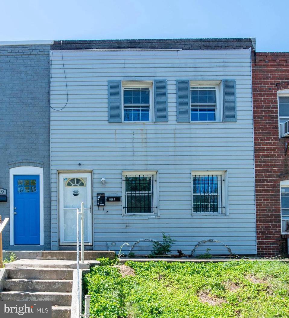Income-generating investment property. Renovated 2-unit multifamily townhome in Baltimore, MD. The top floor has 1 bedroom and full bath, the first floor has 1 bedroom and full bath, and a large walk-out basement with bathroom, separate entrance & possibly another rental. Separately metered electric, for two units. Stackable washers and dryers on each level. Large backyard with parking. Showings by appointment only. Please do not disturb tenants.