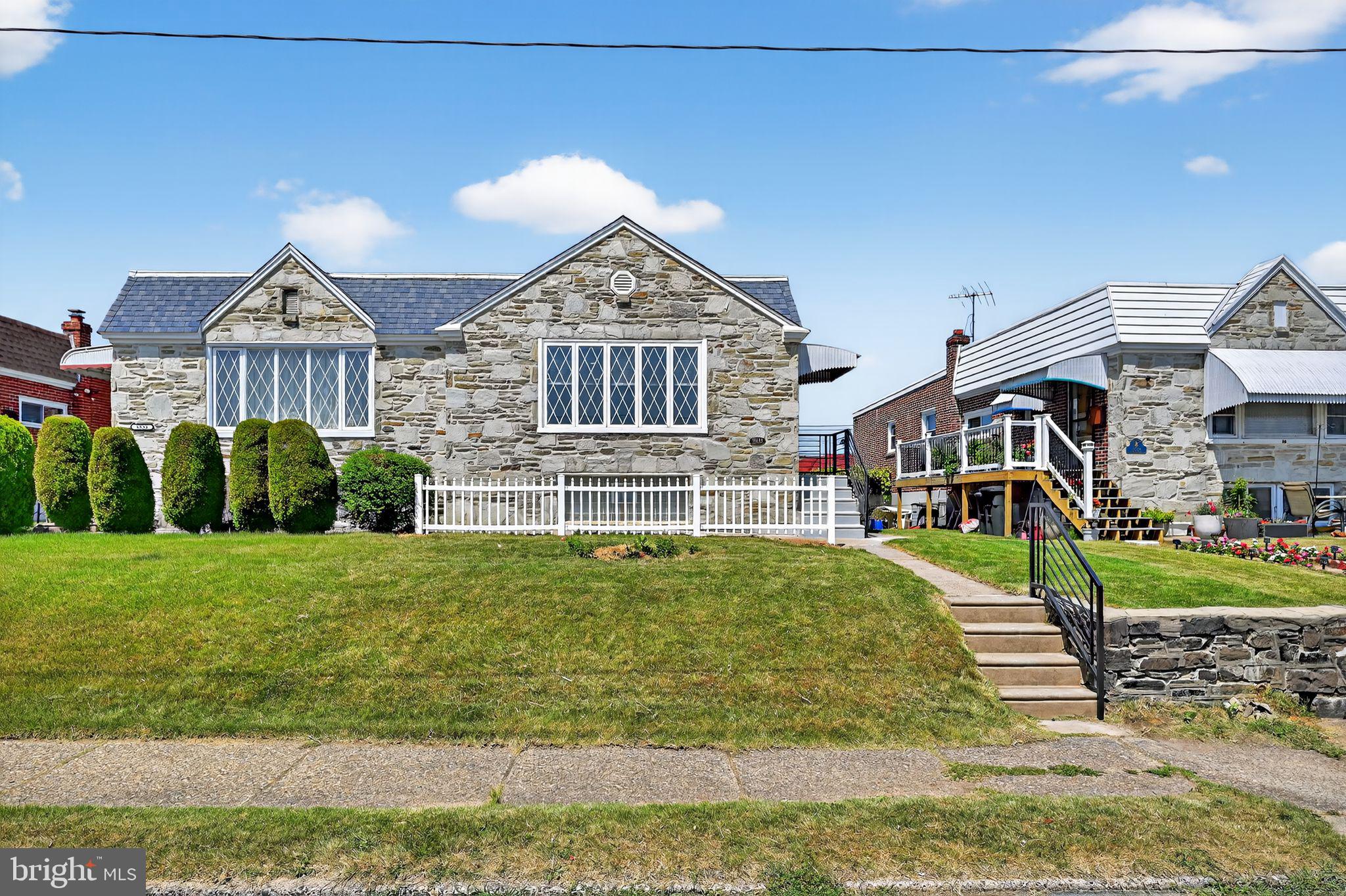 We are pleased to present this meticulously rehabbed property, ideally situated on a desirable block in the sought-after Ashton Wooden Bridge area, just steps from the picturesque Pennypack Park. This spacious residence features a thoughtfully designed layout with 5 bedrooms and 3 bathrooms, making it an excellent choice for families or investors seeking rental opportunities.
The upper level showcases a generous living room, highlighted by an electric fireplace and a 65-inch TV, both included in the sale, creating a warm and welcoming ambiance. The modern kitchen is equipped with brand new appliances, elegant granite countertops, and a custom backsplash, catering to the needs of any culinary enthusiast. Additionally, the home features brand new central air conditioning, ensuring year-round comfort.
The upper level comprises 3 bedrooms and 2 bathrooms, while the lower level offers a comfortable 2-bedroom, 1-bathroom unit. Each level is designed with its own fully equipped kitchen, allowing for the flexibility of using the home as two independent apartments with separate entrances—ideal for multi-generational living or as a lucrative investment opportunity.
The property also boasts a new roof, providing peace of mind and durability for years to come. Additional features include a detached one-car garage, offering convenience and ample storage space. With its prime location, contemporary updates, and versatile living arrangements, this property represents a rare opportunity in today’s market. Don’t miss the chance to make this beautifully renovated home your own!