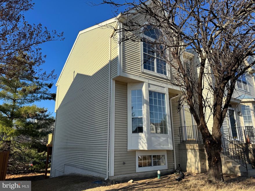 Elegant exterior with a formal interior! This beautifully updated 3-level end-unit townhome offers approximately 2,300 sq. ft. of finished space and a walkout basement. The upper level features three spacious bedrooms and two full baths.

The main level boasts a brand-new kitchen, dining room, new deck, a large living room, new lighting, fresh paint, and a newly renovated half bathroom.

The fully finished basement includes a wet bar, a full bathroom, a bedroom, and a den that can easily serve as a 4th bedroom.

Recent updates include a new roof, new HVAC, new appliances, new washer and dryer, waterproof laminate flooring, new cabinets, quartz countertops, fresh paint throughout, new bathrooms, New plumbing, New Electrical, and new doors.

The open backyard offers both privacy and security, and being an end unit, the home enjoys abundant natural light.

Located in the Southbridge community, residents have access to a clubhouse and pool. The HOA includes pool access and trash service. Conveniently situated just north of Quantico Marine Corps Base, this home is only blocks from Route 1, with easy access to commuter lots, I-95, shopping centers, and restaurants.