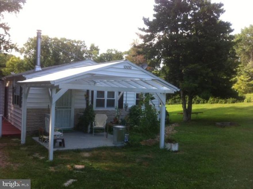 Available on June 1, 2019/ Looking to get away from town?/ Enjoy the peace and Tranquility of living on a more than 1 acre lot Backing to Woods/ The property has been updated in 2013/ Brand New Washer/ Covered Front Porch with Side Deck/ Wood Burning Fireplace/ Hardwood Floors throughout the house/ Easy Access to Rt# 1 and 495