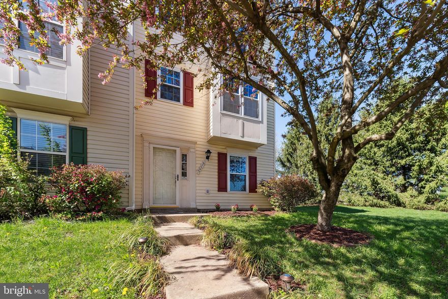 Welcome to this beautifully updated 3 level END UNIT townhome in sought after Ashburn Village! FOUR bedrooms, 3 full baths, gleaming hardwood floors and tons of improvements, this home has it all! The windows and the sliding glass door were replaced in 2022. The spacious foyer welcomes you with its hard flooring. Plenty of space for a console table or shoe storage units. The hall closet has plenty of room for outerwear for you and your guests. The ENTRY LEVEL bedroom is located to the right of the entryway, with its own closet and large, bright window. Past the bedroom you'll find one of three full bathrooms and just beyond that is your fully finished, walk-out living area. All utilities are tucked away in a closet and around the corner is the laundry room. A large storage area under the stairs lends extra space for all your household needs. Walk out to your private, fully fenced backyard complete with a stone and crushed marble patio and walkway to the fence gate. Go upstairs to the main level and find a large, open floor plan that invites you to relax in a combined living and dining area. Hardwood flooring covers the entire main level and a 'set back' area to use however you see fit! Lots of windows bring in tons of natural light and a sliding glass door leads to the deck (deck redone in 2023), backing to mature evergreen trees. The kitchen is light and bright and has plenty of space for a breakfast table! A good-sized bump out offers extra room for a sideboard for extra storage! Stainless steel appliances, granite countertops and a lovely pass-through window with matching granite ledge allow you to stay connected to those in the living and dining areas. Upstairs you'll find the spacious primary bedroom with more hardwoods, newer ceiling fan and a beautifully renovated en-suite bathroom with brand newer vanity, tile, toilet, light fixture and mirror! Down the hall you will find bedrooms 2 & 3, sharing another renovated full bath and hall closet. Location, location, location! Conveniently situated across the street from the Ashburn Village Shopping Center, minutes from One Loudoun, Top Golf, I-Fly, less than 10 miles to Dulles Airport and close to many other shopping, dining and entertainment venues, this location has something for everyone! Your HOA fee includes automatic access to several outdoor pools and ALSO includes your membership to the Sports Pavilion right down the street with indoor/outdoor pools, basketball courts, tennis, racketball, saunas, weight room, and more! Paved paths surround the scenic and peaceful Pavilion Lake for year round fishing, kayaking and nature lovers. Do not miss this terrific townhome.