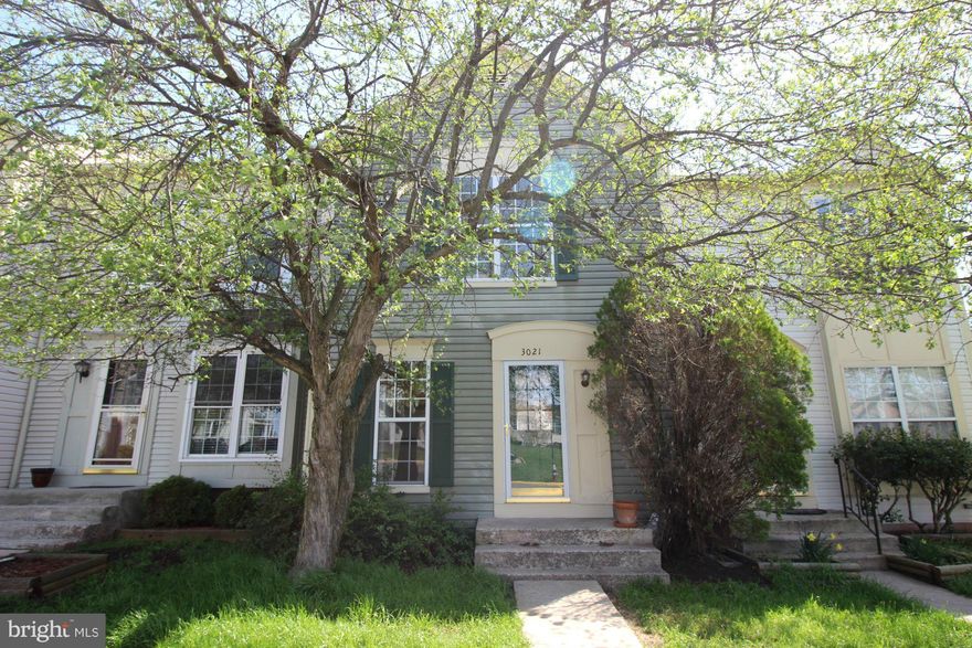 Gorgeous! 3BD, 2.5 BA interior TH. Bright KIT w/ granite, new sink, b-fast bar. Open concept LR/DR w/ new wood floors, wood burning FP w/ tile details. SGD leads to amazing private new wood deck which backs to trees. Spacious BRs upstairs w/ vaulted ceilings, big windows, & new carpet. Walk out lvl basement w/ full BA & BR & access to fenced in back patio w/ landscaping. Walk to restaurants/shops.