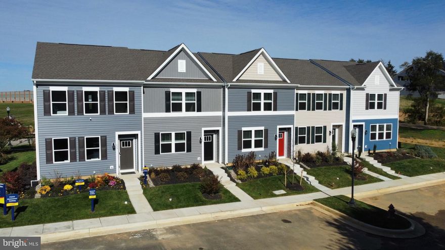 Move-in ready, new construction model townhome on a corner homesite in the Village at Chestertown! This two-story Jefferson is an open-concept end-of-unit townhome with three bedrooms, two and a half bathrooms and custom paint. The first floor is spacious with a large, thoughtfully designed kitchen with stylish gray cabinets, stainless steel appliances, a storage closet and a peninsula island with space for seating. The kitchen is open to the living and dining area providing your ideal space to entertain. The first floor also offers a powder room. The second floor has three large bedrooms, each with plenty of closet space, a hall bathroom, a linen closet, and a laundry closet with an included washer and dryer. The owner’s suite offers privacy away from the other bedrooms and features its own full bathroom and a walk-in closet. The included model home window treatments, whole yard irrigation system, and the exclusive Smart Home® package will give you complete peace of mind. This is not a lease back. Pictures, photographs, colors, features, and sizes are for illustration purposes only and will vary from the homes as built.
