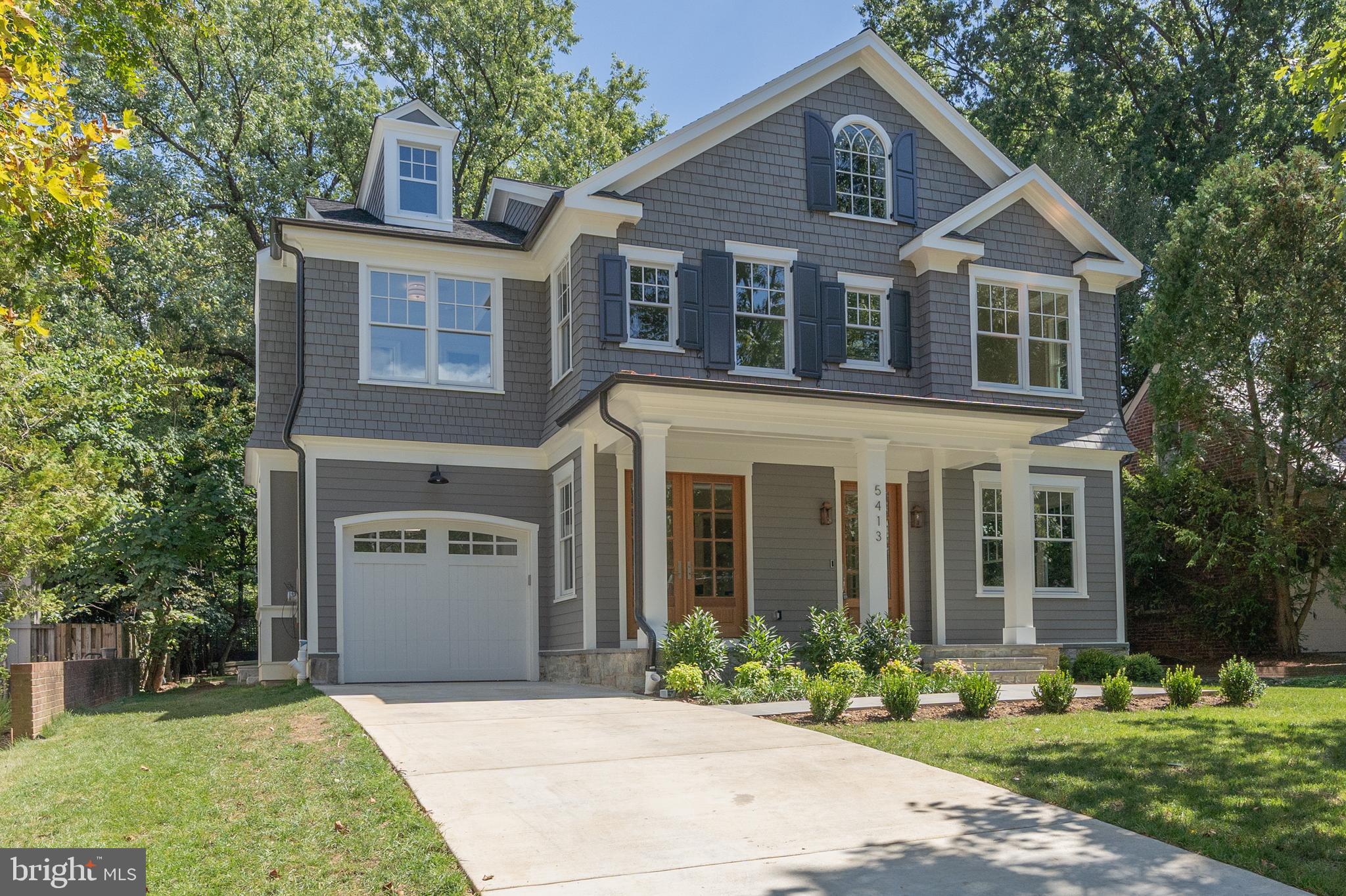 Crafted by Studio Z and expertly built by Holahan Development, this exquisite new cedar shingle Colonial is ideally located in the heart of Chevy Chase Village, offering elevator access to all three levels.
The main level features soaring 10-foot ceilings and includes elegant formal living and dining rooms, a gourmet chef’s kitchen that flows seamlessly into the family room, a butler’s pantry, mudroom, coffee station, walk-in pantry, and a stunning heated screened porch with a fireplace—perfect for year-round indoor-outdoor living.
Upstairs, you'll find four spacious bedrooms and four full bathrooms, including a luxurious primary suite, a convenient laundry room, and three additional bedrooms, each with its own en suite bath.
The fully finished lower level offers a generous recreation room or second living area, an additional bedroom and full bath, a dedicated gym, and a large storage room.
Finishes include custom cabinetry and millwork throughout, beautiful oak flooring, marble and quartz countertops, built-in cabinetry, and charming half-round gutters. The elevator provides easy access to all three levels of the home.
Located just a five-minute walk to the shops, dining, and Metro of Friendship Heights—including Whole Foods, Clyde’s, The Junction, and The Capital Grille—this is a rare opportunity to own a brand-new custom home in one of the DC metro area's most desirable neighborhoods.