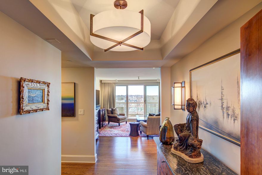 Unparalleled and captivating renovation at Somerset House I! This south-facing, light-filled two bedroom two bath with compact office has been artfully redesigned to provide an open and airy floor plan. High ceilings, stunning hardwood floors, and  designer lighting, along  with your dream kitchen await you. Top of the line finishes throughout include electronic draperies, exquisite door handles, knobs, and fixtures including a disappearing door. 1700 square feet of luxury with additional entertaining space provided by the huge balcony finished with teak wood slatted flooring. Dream kitchen and  designer baths all with exquisite fixtures. Somerset House offers garage parking and storage along with an array of full services: guard house, doormen, front desk staff, on-site management and engineers, full service club house with indoor and outdoor pools, tennis courts, gym, exercise room, locker rooms, board room, card room, and entertaining room too. Somerset House offers easy access to metro and the finest in shopping, restaurants, medical office buildings, and more. Hurry this one is a gem! Monthly condo fee: $1,547