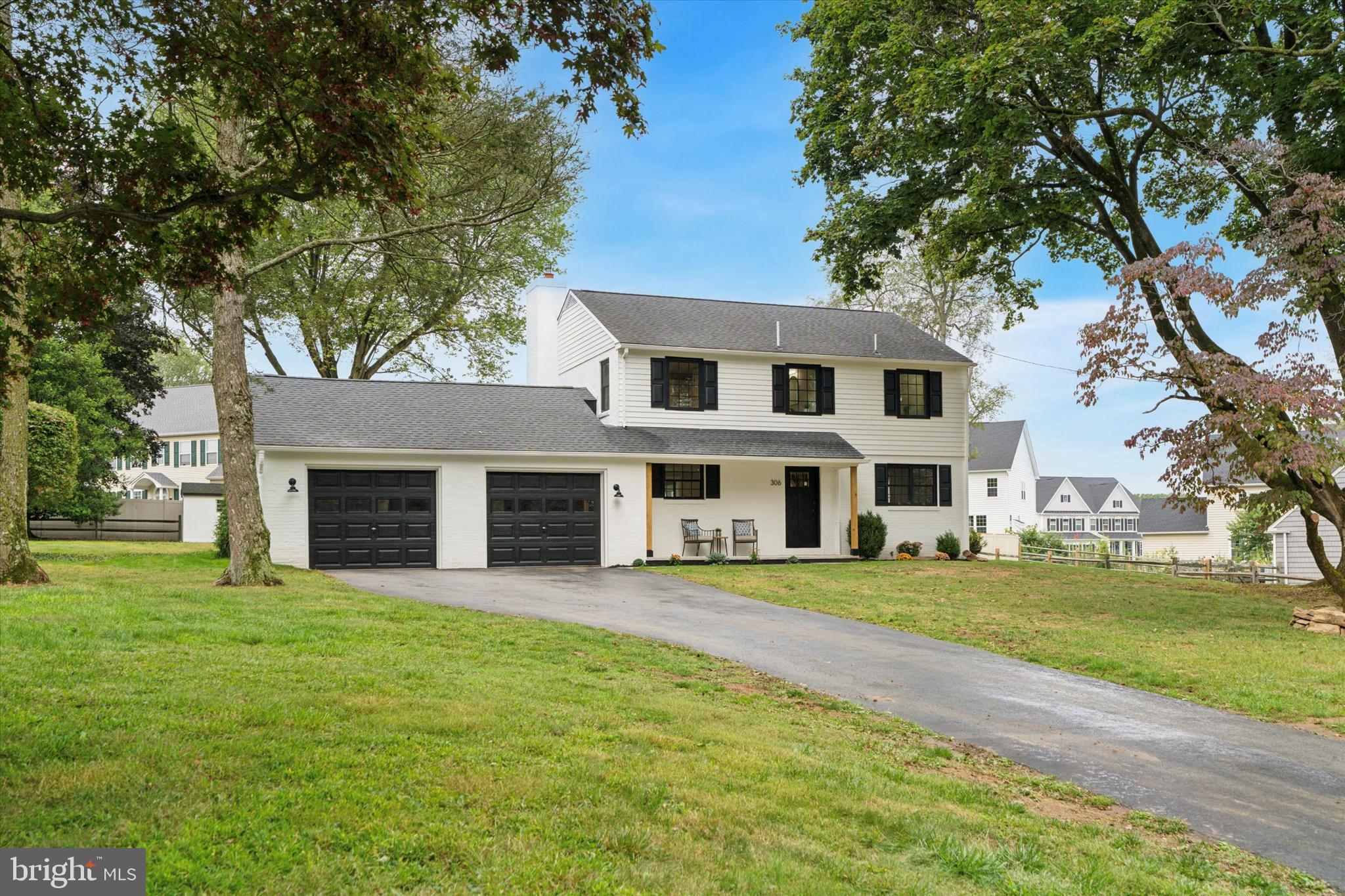 Welcome to 306 Greenhill Rd, a completely renovated 4 bedroom 3.5 bath home on over a half-acre in desirable West Chester! This home was fully gutted down to the studs and subfloors and put back together with top quality materials throughout. Brand new public water service and brand new septic system! All new electric, plumbing with PEX manifold, dual zone heating/central air, black Marvin windows, spray foam insulation, wood flooring, front and back porches, and more! The curb appeal begins as soon as you pull into the driveway with new front walkway, landscaping, split rail fencing, and welcoming covered front porch, an ideal space for your morning coffee or evening glass of wine! Step inside to discover a wide-open floor plan, tons of natural light, and stylish finishes throughout. Featuring 7” wide plank wood flooring, recessed lighting, 5 panel doors, matte black fixtures and hardware, and a thoughtfully designed layout with zero wasted space. The main level of the home is an entertainer’s dream. The kitchen features a stunning tile backsplash, gorgeous quartz counters, large island with counter seating for four, Kohler faucet, pull out trash cabinet, counter depth refrigerator, and an oven with an air fryer setting! The living room includes an oversized picture window and decorative original brick fireplace with custom solid wood mantle made from a reclaimed beam. Enjoy beautiful backyard views through the dining room sliding glass door or step outside onto the covered porch complete with slate flooring, vaulted ceilings, custom black metal railings, and ceiling fan with remote… the perfect space for grilling, entertaining, dining al fresco, or watching the game! The 4th bedroom of this home is located on the 1st floor and would make a great guest room, office space, or both- as shown! Also tucked away on this level are a half bathroom and a coat closet for added convenience. The original wooden staircase has been beautifully refinished and includes custom metal railings leading you upstairs where you’ll find 3 bedrooms, 2 full bathrooms, hall linen closet, and pull-down staircase for attic access and extra storage space. The spacious primary suite has vaulted ceilings, arched doorway leading to a customizable walk-in closet, an ensuite bathroom with space saving pocket door, pebble stone shower floor tile, and Kohler fixtures and toilet, and an additional bedroom closet. The secondary bedrooms are both a great size with good closet space. The hall bathroom features a double sink vanity with marble counter and great storage, Kohler/Moen fixtures, arched mirrors, and a bathtub. Downstairs you’ll find a massive, finished basement with full bathroom, laundry room, mechanical room, and bilco doors that lead to the side yard and make furnishing this space a breeze. The basement offers flexible space for a family room, home gym, children’s play area, bar, or any configuration that suits your family’s needs! The basement and 1st floor’s heating and cooling are controlled by one thermostat while the 2nd floor has its own thermostat... combine this with the spray foam insulation throughout and you have an extremely efficient home! An oversized two car garage, yard storage shed, custom distressed paint finish on the rear wood siding, approximately 2300sq ft of interior living space, and fencing around this sizable level lot all complete this perfect package. The garage has a door that leads to the backyard as well as a door that leads into the kitchen (garage photo with wet floor was taken after pressure washing). Conveniently located minutes away from parks, restaurants, shops, top rated West Chester schools, gyms, highways, etc and just a 5-minute drive to the fine dining, boutiques, pubs, coffee shops, and events that downtown West Chester offers. Check out this home today, you won’t be disappointed! Listing agent is the owner.